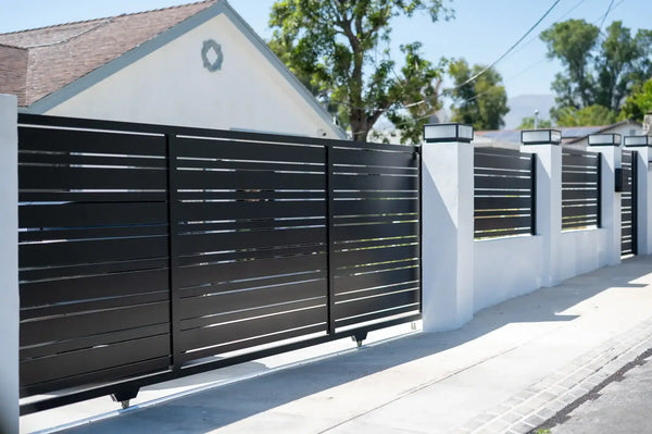 Black aluminum security fence and wall topper